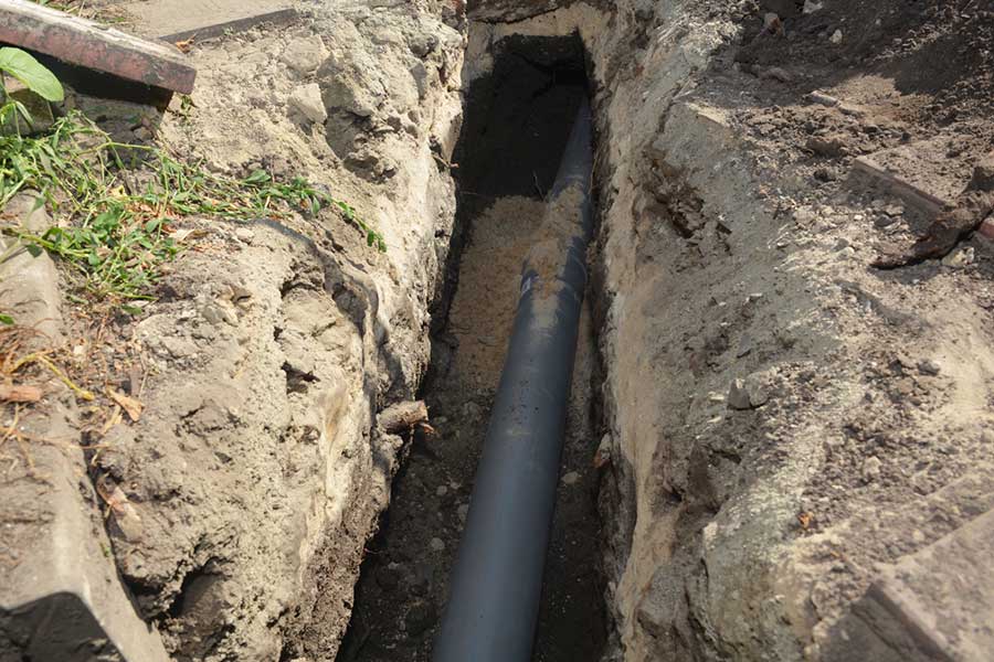Underground pipe exposed during drain maintenance in Lake Oswego