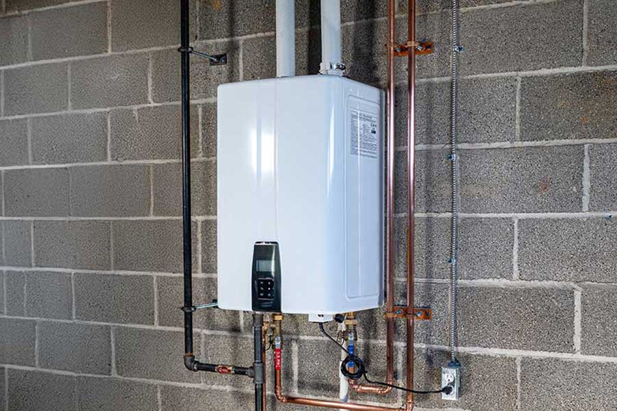 Wall-mounted tankless water heater needing repair in Lake Oswego